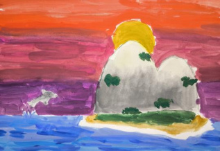 Дельфин резвится на закате